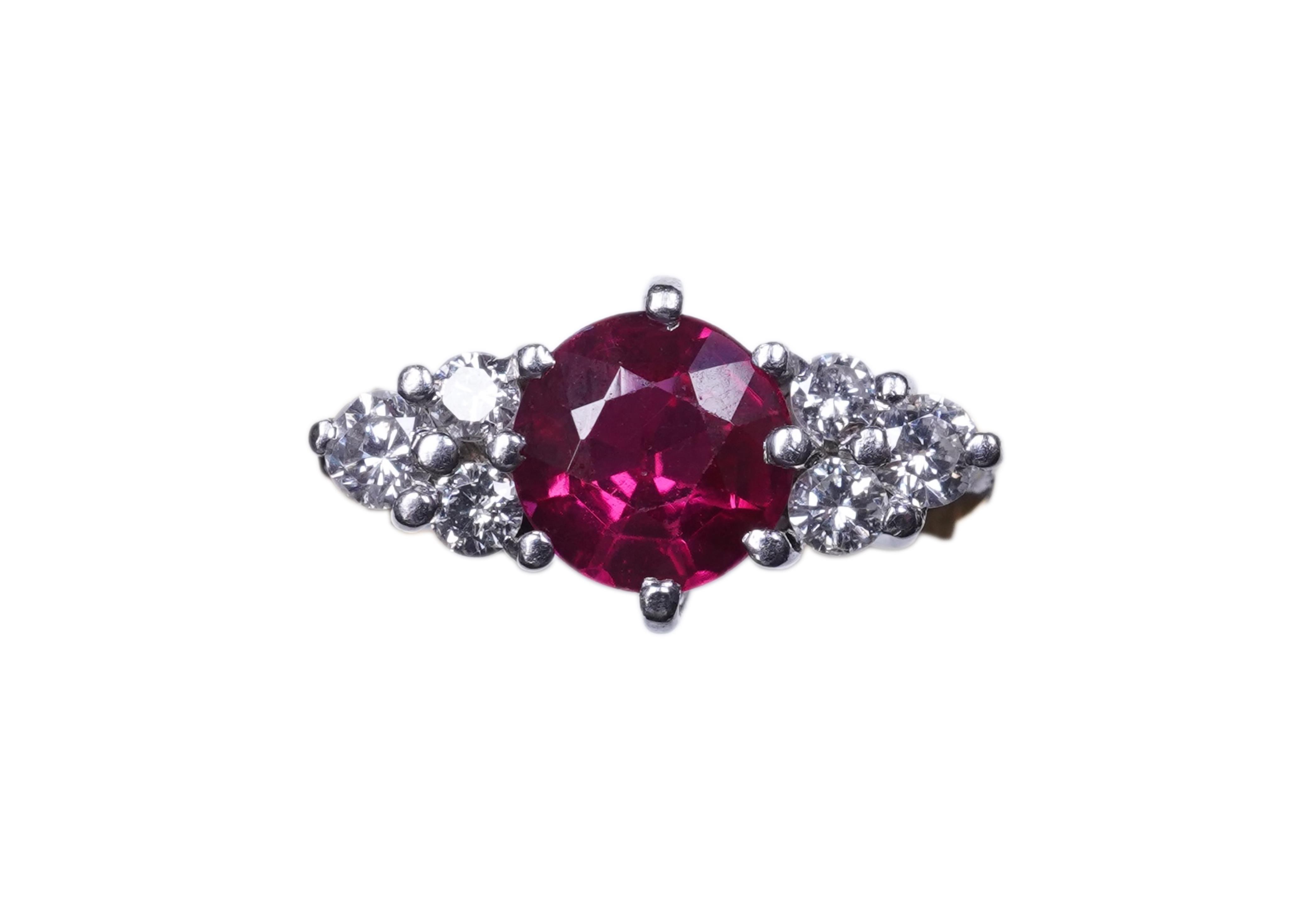 A synthetic ruby and diamond ring